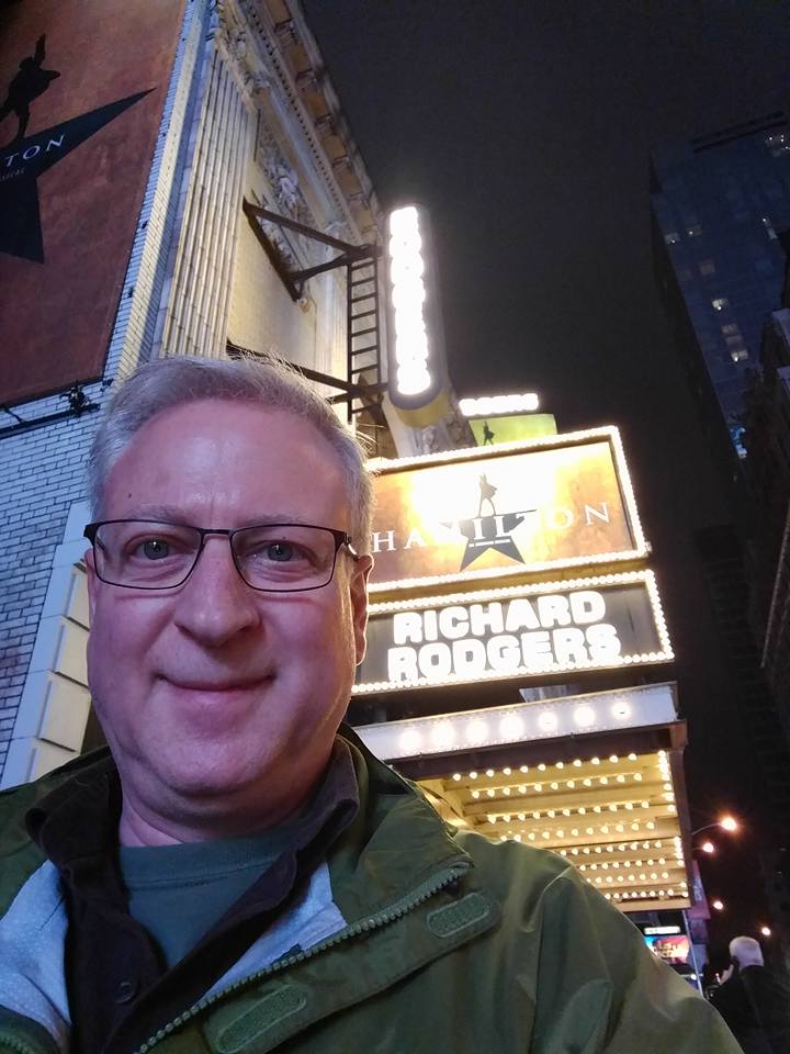 New York City tourist in front of the Richard Rodgers Theatre, waiting to go see Hamilton