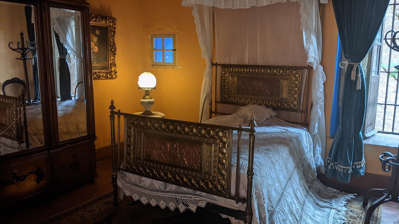 A bedroom inside the house