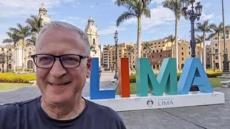 Lane standing in front ot the Lima sign in Plaza de Armas