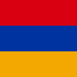 A rectangular flag with a field of red across the top, blue across the middle, and gold across the bottom